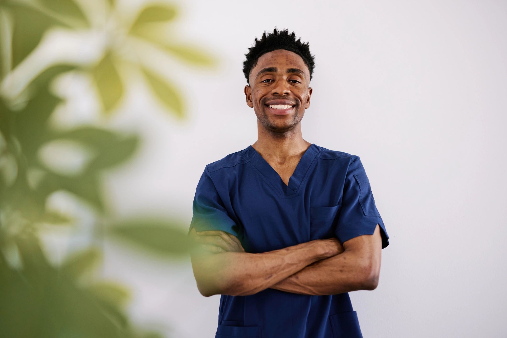 Student in healthcare scrubs