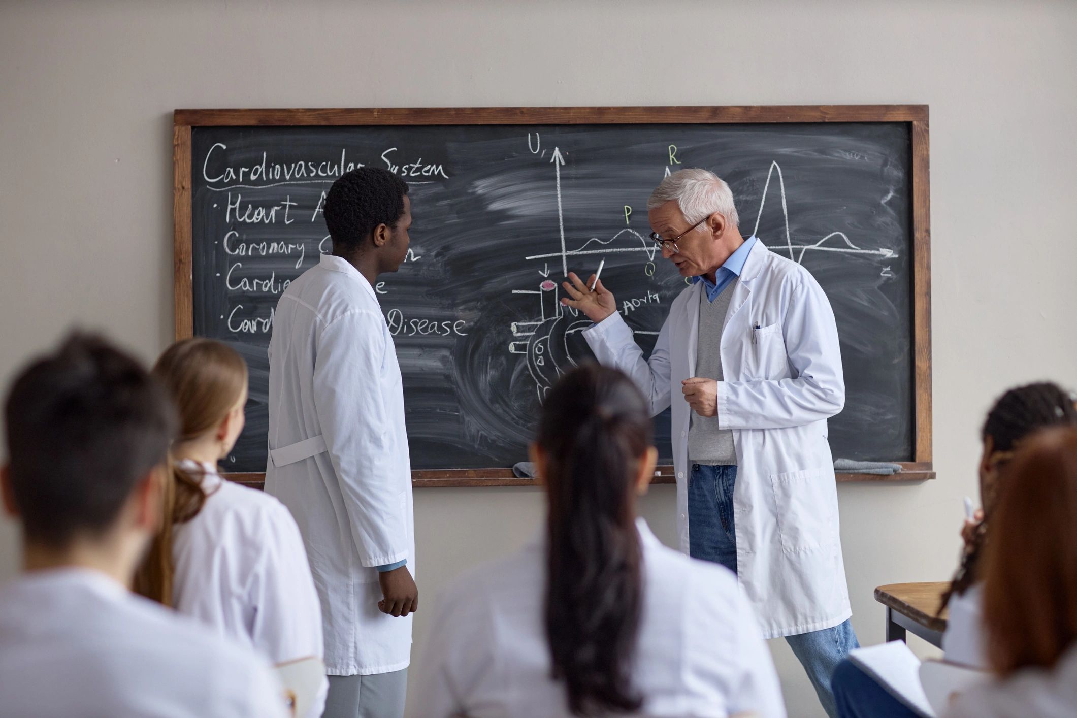 Healthcare instructor teaching students in a classroom